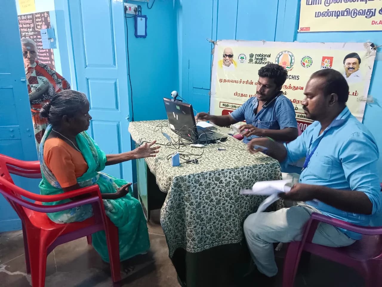 Elders taking part in a seated exercise session at the home